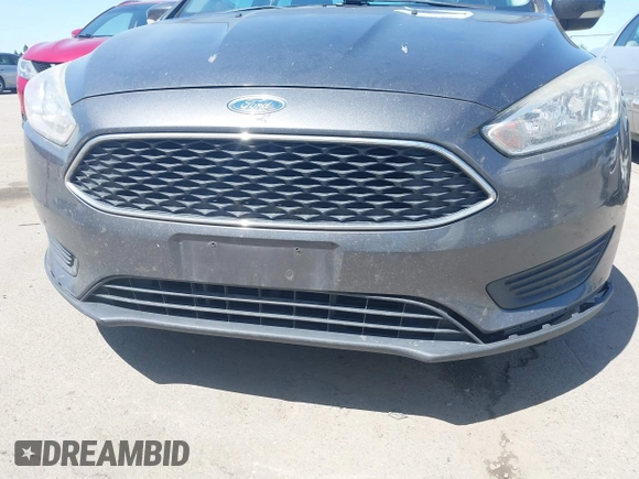 2017 Ford Focus SE z VIN 1FADP3F26HL308880, wystawiony jako IAAI lot #41991909 z przebiegiem 103 403 mil mil oraz . Historia ofert i sprzedaży dostępna na DreamBid. Obrazek 13.