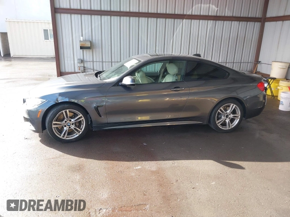 2015 BMW 4 Series 435i with VIN WBA3R1C59FK194649, listed as a IAAI auction lot 41565414 with 123,702 mi miles and . Bid and sale history available at DreamBid. Image 14.