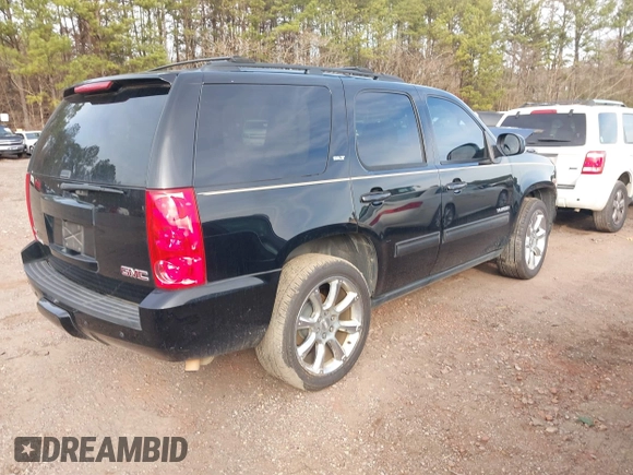 2012 GMC Yukon SLT with VIN 1GKS1CE06CR104447, listed as a IAAI auction lot 41589823 with 183,003 mi miles. Bid and sale history available at carsss.com. Image 4.