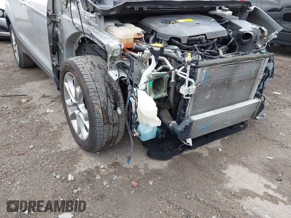2015 Ford Escape Titanium with VIN 1FMCU0JX7FUB60418, listed as a IAAI auction lot 42485107 with 82,172 mi miles and . Bid and sale history available at DreamBid. Image 6.