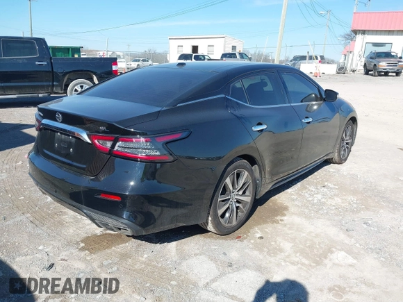 2019 Nissan Maxima Platinum z VIN 1N4AA6AV0KC365901, wystawiony jako IAAI lot #41473793 z przebiegiem 137 772 mil mil oraz . Historia ofert i sprzedaży dostępna na DreamBid. Obrazek 4.