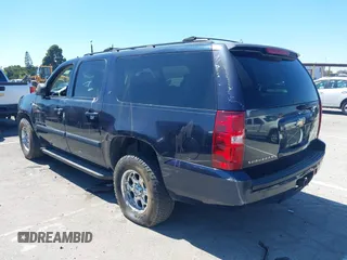 2007 Chevrolet Suburban LS with VIN 1GNFC16077J315274, listed as a IAAI auction lot 42629624 with 217,224 mi miles and . Bid and sale history available at DreamBid. Image 3.