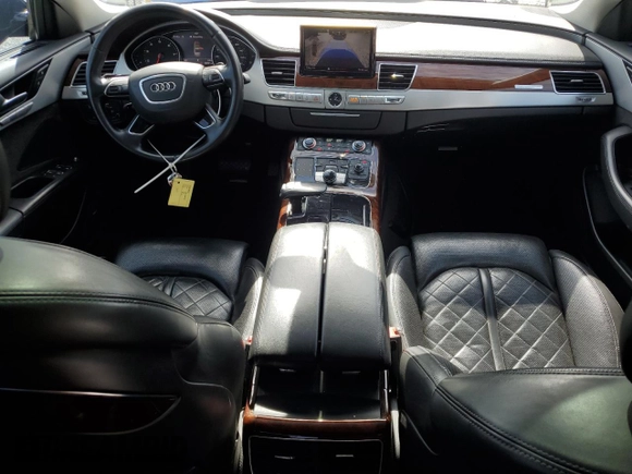 2013 Audi A8 3.0L с VIN WAUAGAFDXDN003929, выставлен на аукционе Copart как лот 44928465 с пробегом 186 921 миль миль и Списание • Salvage title. История ставок и продаж доступна на DreamBid. Изображение 8.