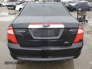 2012 Ford Fusion SEL z VIN 3FAHP0JAXCR156966, wystawiony jako Copart lot #47813775 z przebiegiem 117 963 mil mil oraz Szkody całkowita. Historia ofert i sprzedaży dostępna na DreamBid. Obrazek 6.