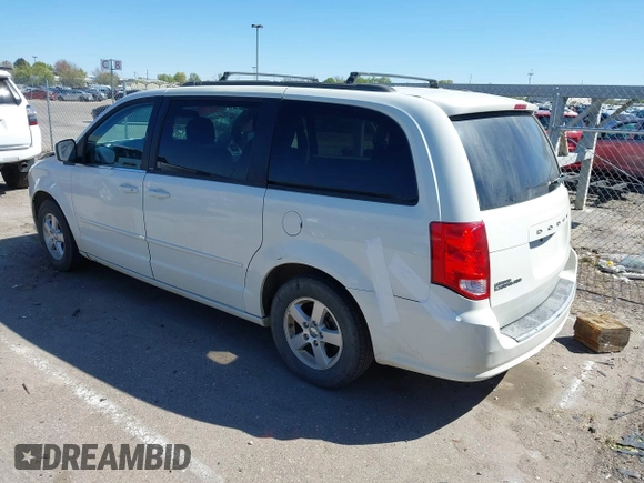 2012 Dodge Grand Caravan SXT with VIN 2C4RDGCGXCR365194, listed as a IAAI auction lot 42058530 with 131,059 mi miles and . Bid and sale history available at DreamBid. Image 3.