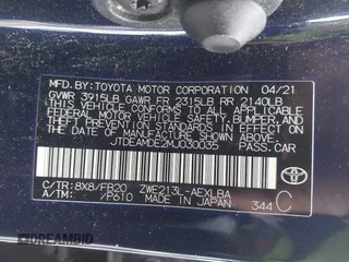 2021 Toyota Corolla Hybrid LE with VIN JTDEAMDE2MJ030035, listed as a IAAI auction lot 41644662 with 130,693 mi miles. Bid and sale history available at carsss.com. Image 9.