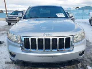 2011 Jeep Grand Cherokee Laredo with VIN 1J4RR4GG7BC584500, listed as a IAAI auction lot 41383355 with 161,722 mi miles. Bid and sale history available at carsss.com. Image 12.