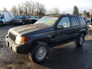 1998 Jeep Grand Cherokee Limited with VIN 1J4GZ78S0WC138917, listed as a Copart auction lot 86223974 with 152,482 mi miles and Clean Title. Bid and sale history available at carsss.com. Image 1.