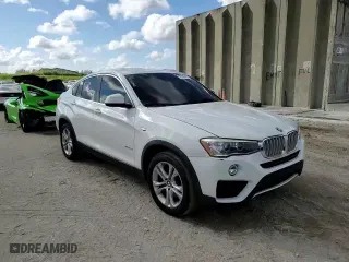 2016 BMW X4 xDrive28i with VIN 5UXXW3C57G0M90063, listed as a Copart auction lot 70259642 with 74,060 mi miles. Bid and sale history available at carsss.com. Image 12.