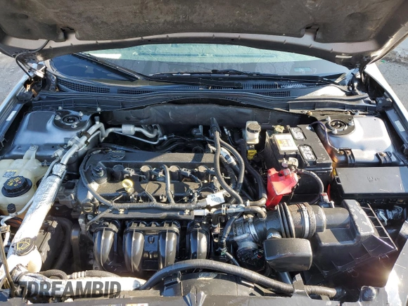 2012 Ford Fusion SE z VIN 3FAHP0HA0CR437115, wystawiony jako Copart lot #56583495 z przebiegiem 159 649 mil mil oraz Szkoda całkowita • Salvage title. Historia ofert i sprzedaży dostępna na DreamBid. Obrazek 11.