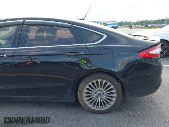 2016 Ford Fusion Titanium with VIN 3FA6P0K90GR179528, listed as a IAAI auction lot 42181213 with 230,264 mi miles. Bid and sale history available at carsss.com. Image 19.