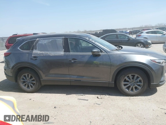2021 Mazda CX-9 Touring with VIN JM3TCACY2M0502016, listed as a IAAI auction lot 41825456 with 86,068 mi miles. Bid and sale history available at carsss.com. Image 13.