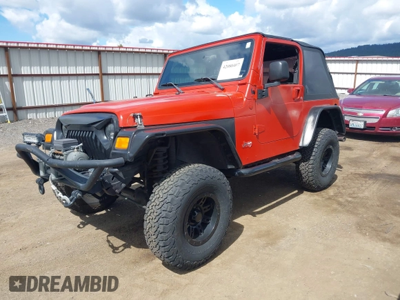 2005 Jeep Wrangler X with VIN 1J4FA39S35P358201, listed as a IAAI auction lot 42080407 with 130,110 mi miles. Bid and sale history available at carsss.com. Image 18.