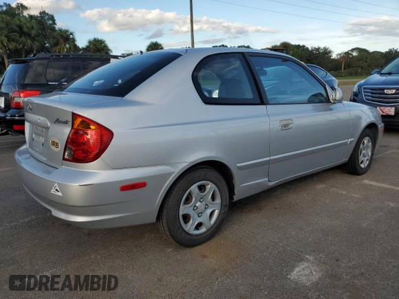 2004 Hyundai Accent GL with VIN KMHCG35C74U312579, listed as a Copart auction lot 75397884 with 0 mi miles and Salvage Title. Bid and sale history available at carsss.com. Image 3.
