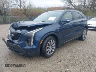 2021 Cadillac XT4 AWD Sport with VIN 1GYFZFR45MF053573, listed as a IAAI auction lot 41909784 with 36,309 mi miles and . Bid and sale history available at DreamBid. Image 2.