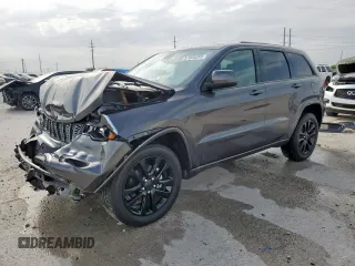 2019 Jeep Grand Cherokee Upland with VIN 1C4RJEAGXKC857859, listed as a Copart auction lot 57405585 with 54,237 mi miles and Salvage title. Bid and sale history available at DreamBid. Image 1.