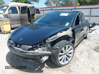 2018 Tesla Model 3 Long Range Battery with VIN 5YJ3E1EAXJF019907, listed as a IAAI auction lot 41995969 with Not Provided miles and . Bid and sale history available at DreamBid. Image 6.