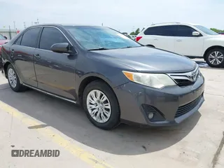 2014 Toyota Camry L with VIN 4T4BF1FKXER379158, listed as a IAAI auction lot 42050926 with 88,060 mi miles and . Bid and sale history available at DreamBid. Image 1.