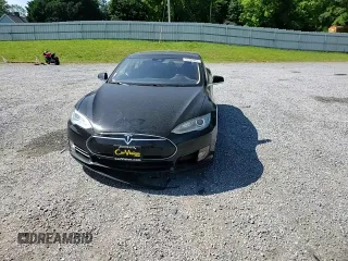 2016 Tesla Model S 70 with VIN 5YJSA1E17GF123934, listed as a Copart auction lot 55202865 with 132,027 mi miles and Salvage title. Bid and sale history available at DreamBid. Image 13.