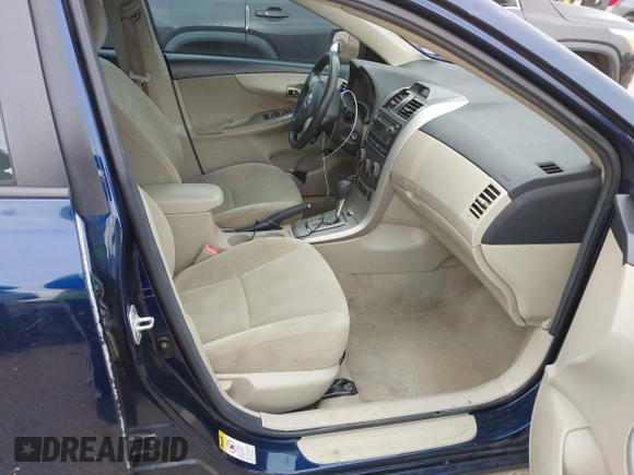 2012 Toyota Corolla L with VIN 5YFBU4EE7CP061770, listed as a IAAI auction lot 41922205 with 154,615 mi miles. Bid and sale history available at carsss.com. Image 5.