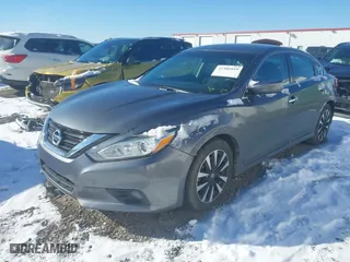 2018 Nissan Altima 2.5 SV with VIN 1N4AL3AP3JC101063, listed as a IAAI auction lot 41381019 with 198,695 mi miles. Bid and sale history available at carsss.com. Image 17.