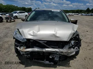 2018 Ford Focus SE z VIN 1FADP3F27JL226890, wystawiony jako Copart lot #56505085 z przebiegiem 112 865 mil mil oraz Szkoda całkowita • Salvage title. Historia ofert i sprzedaży dostępna na DreamBid. Obrazek 5.