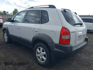 2005 Hyundai Tucson GLS with VIN KM8JN72D15U082153, listed as a IAAI auction lot 42150901 with 209,250 mi miles. Bid and sale history available at carsss.com. Image 3.