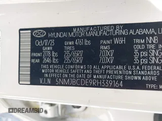 2024 Hyundai Tucson SEL with VIN 5NMJBCDE9RH339164, listed as a IAAI auction lot 42141110 with 30,230 mi miles and . Bid and sale history available at carsss.com. Image 9.