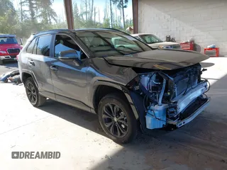 2022 Toyota RAV4 Hybrid SE with VIN 2T3T6RFVXNW033965, listed as a IAAI auction lot 42368450 with 27,377 mi miles and . Bid and sale history available at DreamBid. Image 1.
