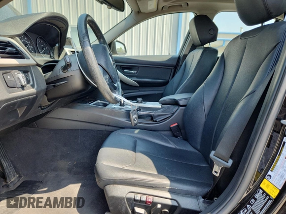 2014 BMW 3 Series 320i xDrive with VIN WBA3C3G5XENS71856, listed as a Copart auction lot 58265805 with 122,478 mi miles and Salvage title. Bid and sale history available at DreamBid. Image 7.