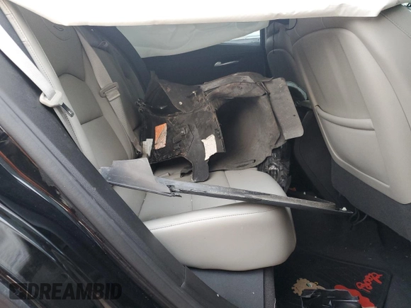 2023 Cadillac XT4 FWD Luxury with VIN 1GYAZAR45PF218684, listed as a Copart auction lot 46483515 with 74,920 mi miles and Salvage title. Bid and sale history available at DreamBid. Image 11.