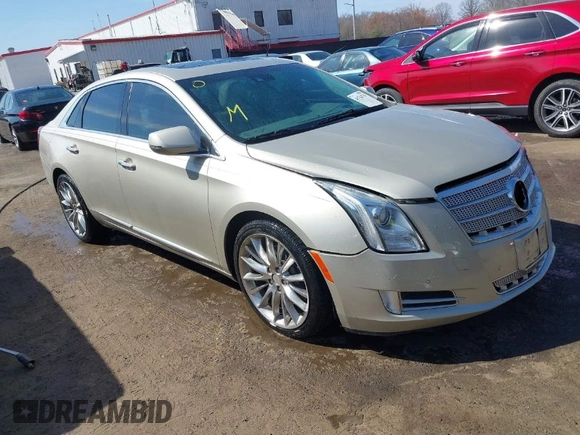 2013 Cadillac XTS Platinum z VIN 2G61U5S37D9209926, wystawiony jako IAAI lot #41754716 z przebiegiem 126 239 mil mil oraz . Historia ofert i sprzedaży dostępna na DreamBid. Obrazek 1.