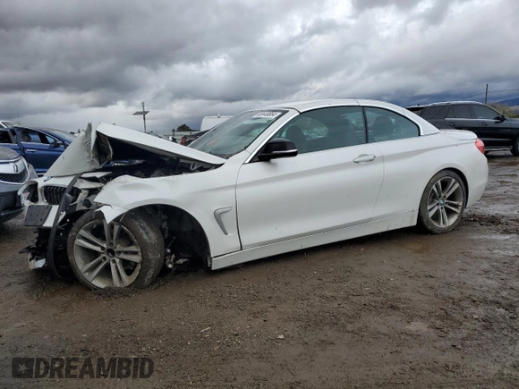 2014 BMW 4 Series 428i with VIN WBA3V7C59EJ872481, listed as a Copart auction lot 82449884 with 82,303 mi miles and Salvage title. Bid and sale history available at DreamBid. Image 1.