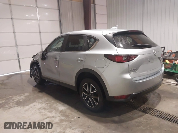 2018 Mazda CX-5 Touring with VIN JM3KFBCM7J0347769, listed as a IAAI auction lot 41611985 with 158,579 mi miles. Bid and sale history available at carsss.com. Image 3.