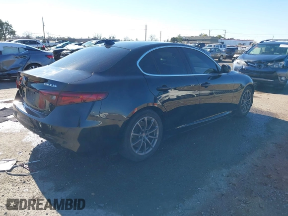 2018 Alfa Romeo Giulia with VIN ZARFAEBN5J7581071, listed as a IAAI auction lot 41313207 with 91,793 mi miles. Bid and sale history available at carsss.com. Image 4.