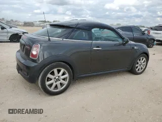 2014 MINI Coupe S z VIN WMWSX3C59ET409209, wystawiony jako Copart lot #78886564 z przebiegiem 118 632 mil mil oraz Tytuł czysty. Historia ofert i sprzedaży dostępna na DreamBid. Obrazek 3.