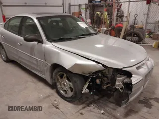 2003 Pontiac Grand Am GT with VIN 1G2NW52E93M605453, listed as a IAAI auction lot 41546839 with 202,918 mi miles. Bid and sale history available at carsss.com. Image 1.