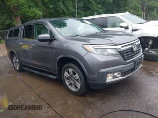 2019 Honda Ridgeline RTL-E z VIN 5FPYK3F72KB018076, wystawiony jako IAAI lot #42633466 z przebiegiem 36 543 mil mil oraz . Historia ofert i sprzedaży dostępna na DreamBid. Obrazek 1.