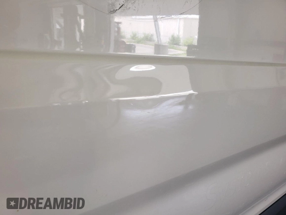 2020 Ford Transit Cargo with VIN 1FTBR2YG0LKA26098, listed as a IAAI auction lot 42905476 with 99,706 mi miles and . Bid and sale history available at DreamBid. Image 9.