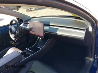 2019 Tesla Model 3 Mid Range with VIN 5YJ3E1EA6KF402308, listed as a IAAI auction lot 40077902 with 89,794 mi miles and . Bid and sale history available at carsss.com. Image 5.