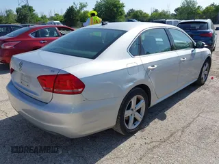 2013 Volkswagen Passat SE with VIN 1VWBH7A36DC001528, listed as a IAAI auction lot 42568026 with 186,814 mi miles and . Bid and sale history available at DreamBid. Image 4.