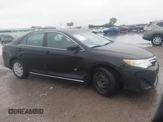 2014 Toyota Camry L with VIN 4T1BF1FK0EU823710, listed as a IAAI auction lot 42153523 with 105,468 mi miles and . Bid and sale history available at DreamBid. Image 6.