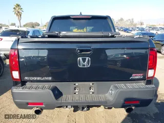 2021 Honda Ridgeline Sport with VIN 5FPYK3F14MB013671, listed as a IAAI auction lot 41361179 with 91,121 mi miles. Bid and sale history available at carsss.com. Image 16.