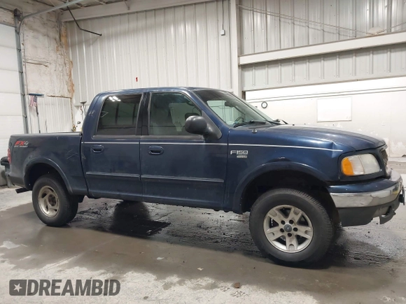 2003 Ford F-150 XLT z VIN 1FTRW08L73KC11631, wystawiony jako IAAI lot #42673130 z przebiegiem 188 945 mil mil oraz . Historia ofert i sprzedaży dostępna na DreamBid. Obrazek 13.