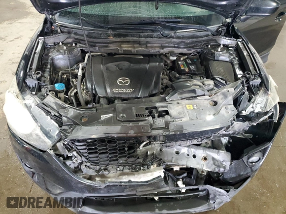 2014 Mazda CX-5 Grand Touring with VIN JM3KE4DY0E0322606, listed as a Copart auction lot 54381815 with 216,022 mi miles and Salvage Title. Bid and sale history available at DreamBid. Image 12.