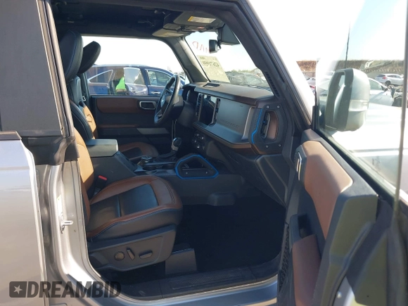 2023 Ford Bronco with VIN 1FMDE5DH5PLA98754, listed as a IAAI auction lot 42671959 with 36,257 mi miles and . Bid and sale history available at DreamBid. Image 5.