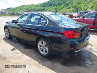 2017 BMW 3 Series 330i xDrive with VIN WBA8D9C32HA011814, listed as a IAAI auction lot 42254352 with 104,547 mi miles and . Bid and sale history available at DreamBid. Image 3.