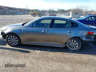 2016 Kia Optima EX with VIN 5XXGU4L36GG098749, listed as a IAAI auction lot 41191912 with 113,019 mi miles and . Bid and sale history available at DreamBid. Image 14.