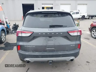 2021 Ford Escape Titanium with VIN 1FMCU9J92MUA27097, listed as a IAAI auction lot 41542774 with 14,822 mi miles and . Bid and sale history available at carsss.com. Image 17.