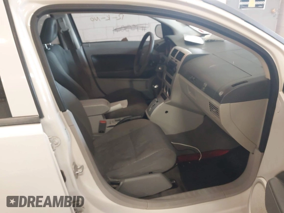 2007 Dodge Caliber SXT with VIN 1B3HB48B67D412339, listed as a IAAI auction lot 42103451 with 170,695 mi miles and . Bid and sale history available at DreamBid. Image 5.